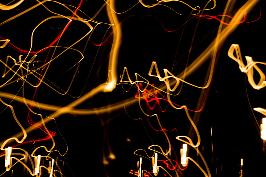 Abstract light trails on black background