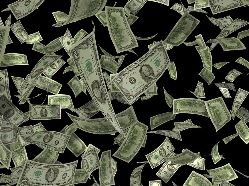 Falling US Dollar Bills on Black Background