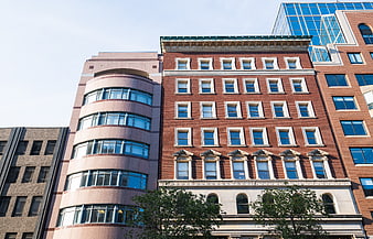 Urban Architecture: Red Brick Building with Modern Glass Facade