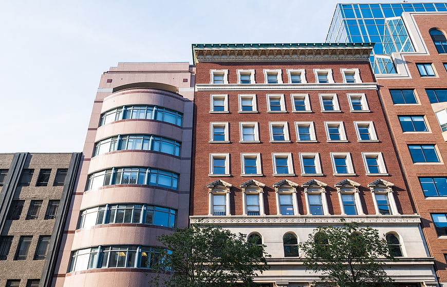 Urban Architecture: Red Brick Building with Modern Glass Facade