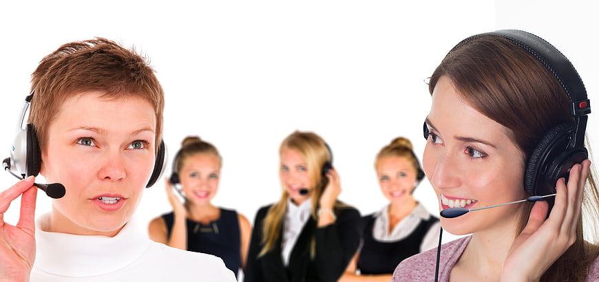 Call Center Agents Wearing Headsets on White Background