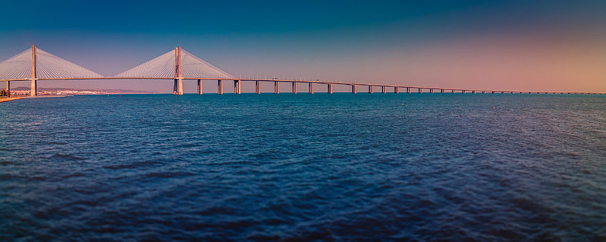 Vasco da Gama Bridge Panorama at Sunset Over the Tagus River