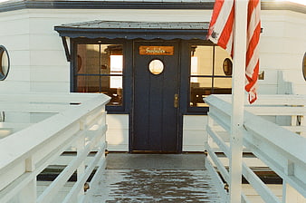 Entrance to The Surfrider Restaurant on a Pier