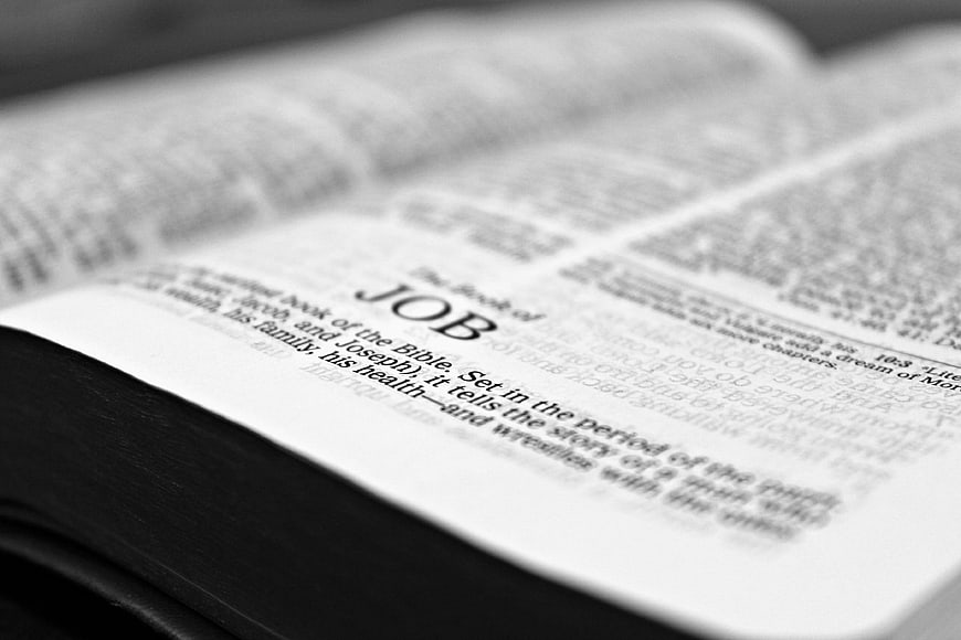 Close-up of open Bible on the Book of Job page