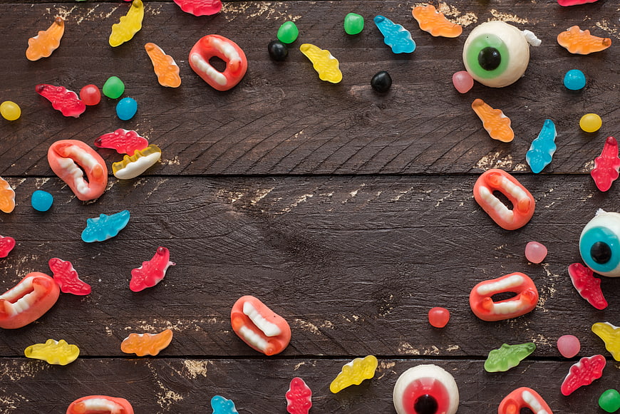 Halloween Gummy Candy Flat Lay on Dark Wood