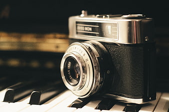 Vintage Zeiss Ikon Camera on Piano Keys
