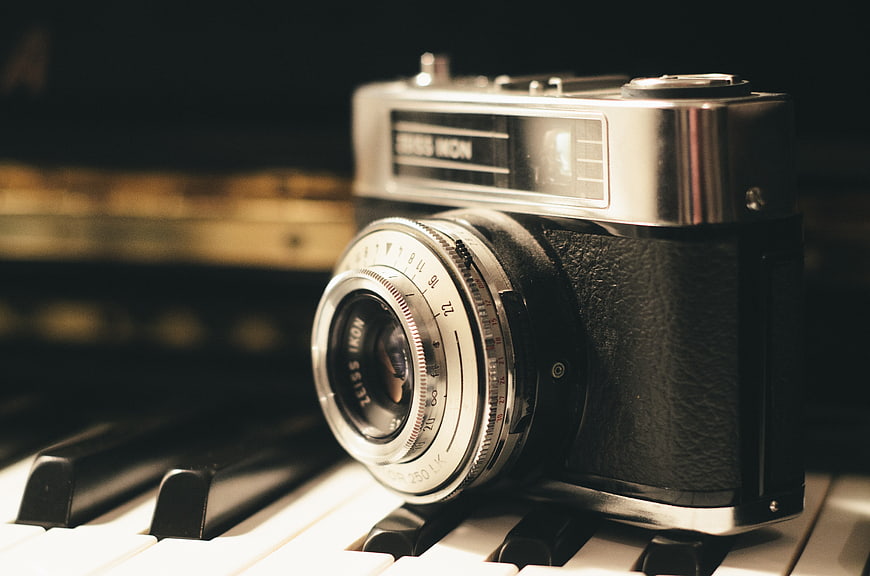 Vintage Zeiss Ikon Camera on Piano Keys