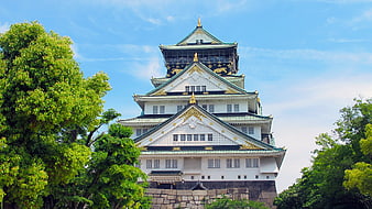 Osaka Castle Main Keep Against Blue Sky