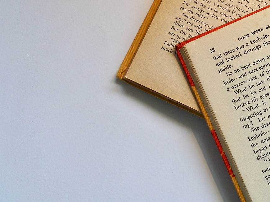 Vintage Open Book on White Background with Copyspace