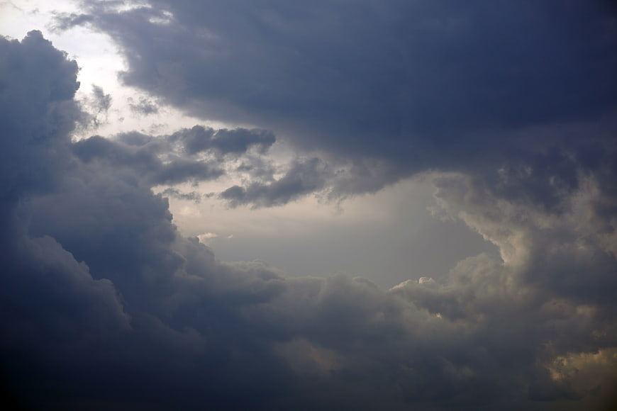 Dramatic Storm Clouds with Sunlight Breaking Through