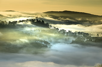 Misty Mountain Landscape with Golden Morning Sunlight