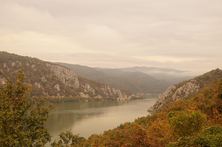 Scenic Danube River Gorge in Romania with Autumn Foliage