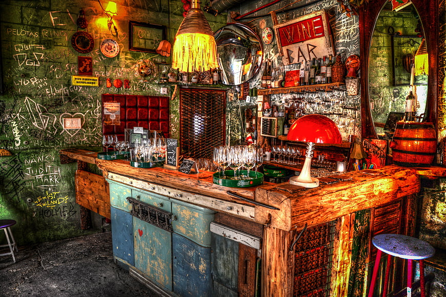Eclectic Ruin Bar Interior with Graffiti Walls and Vintage Decor