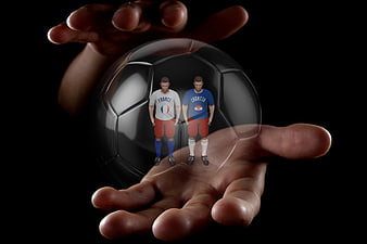 Conceptual 3D hands holding glass football with France and Croatia players