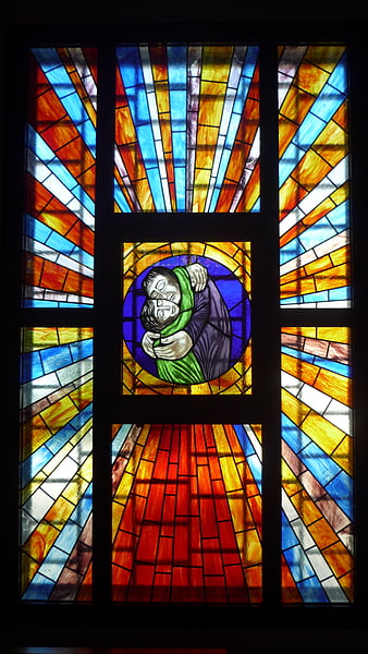 Colorful Stained Glass Window with Hugging Figures