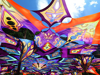 Vibrant psychedelic fabric canopy at outdoor festival