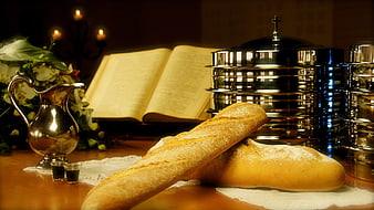 Catholic Communion Setup with Bread, Wine, and Bible