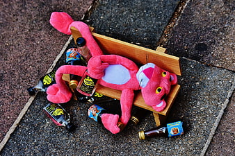 Pink Panther plush toy passed out with miniature alcohol bottles