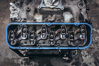 Close-up of vintage car engine valve train with rocker arms