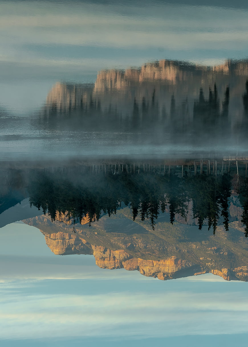 Abstract Surreal Landscape with Inverted Mountain Reflection