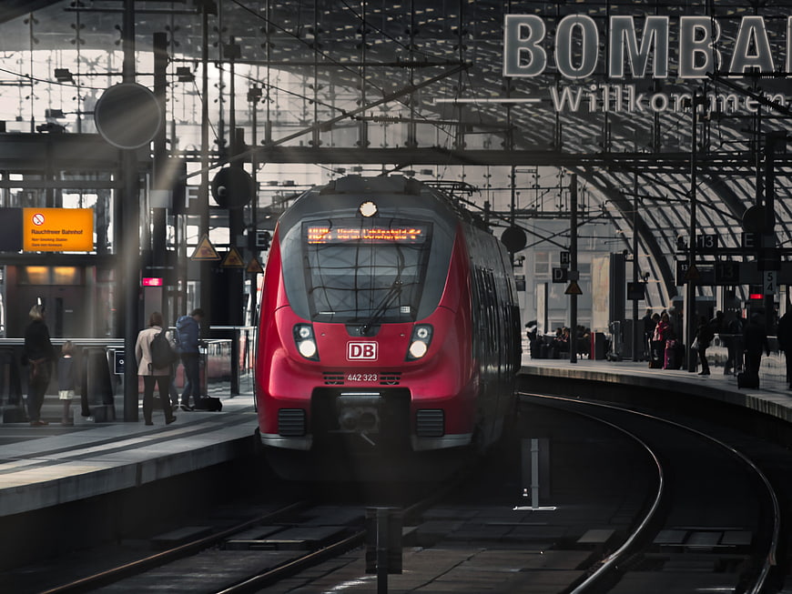 Red DB Train Arriving at Berlin Central Station Platform