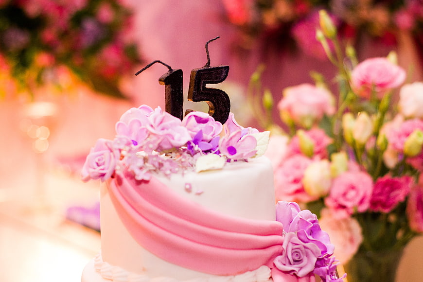 Sweet 15 Birthday Cake with Pink Flowers and Candles