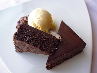 Chocolate Brownie with Vanilla Ice Cream on White Plate