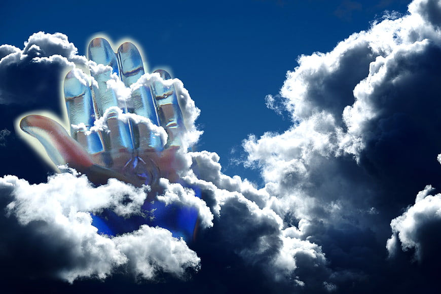 Translucent Hand Emerging from Clouds in Blue Sky