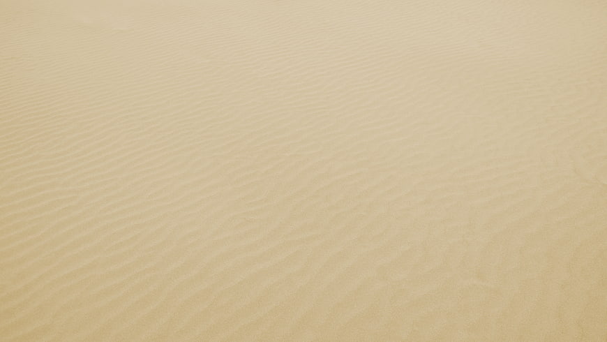 Close-up of rippled sand texture on a beach
