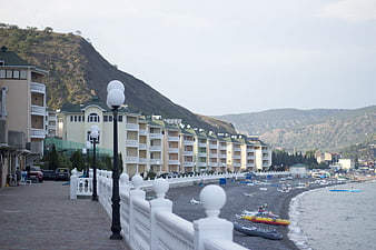 Seaside promenade with hotels and pebble beach