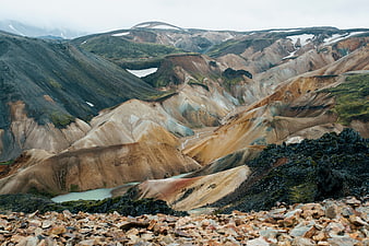 Colorful volcanic mountains and glacial river landscape