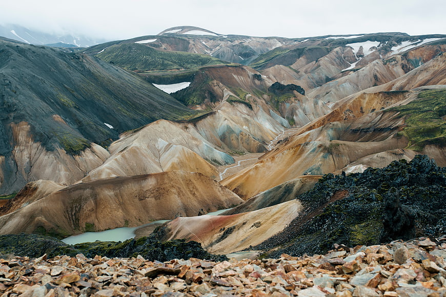 Colorful volcanic mountains and glacial river landscape