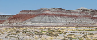Colorful layered mesa in the arid desert landscape