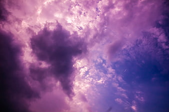 Dramatic purple and pink storm clouds in the sky