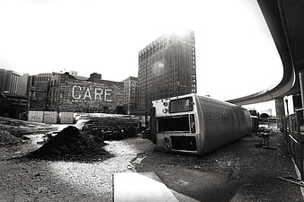 Abandoned Bus on Urban Construction Site with Graffiti