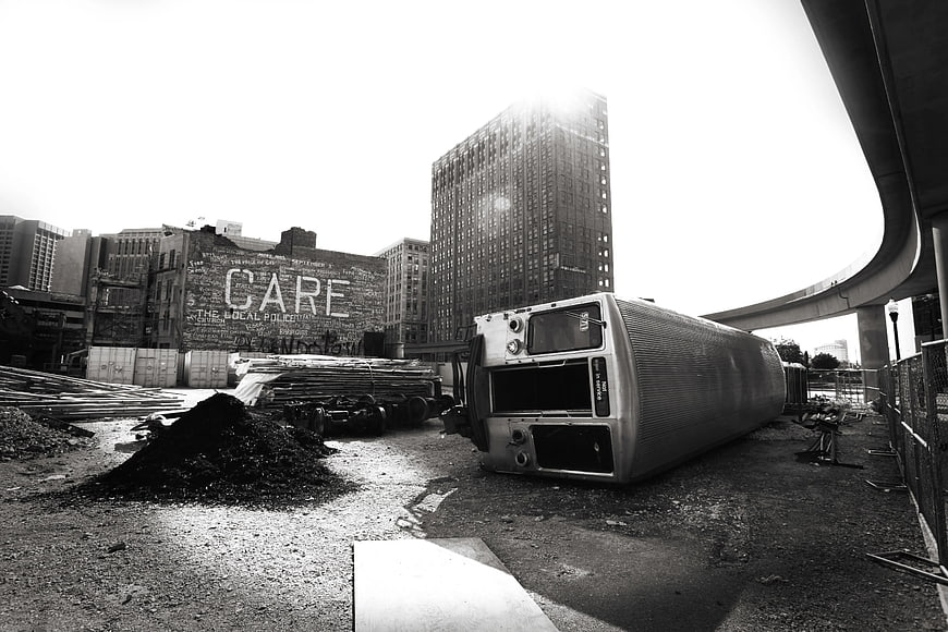 Abandoned Bus on Urban Construction Site with Graffiti