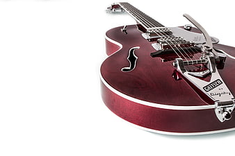 Red Gretsch Electric Guitar with Bigsby Vibrato on White Background