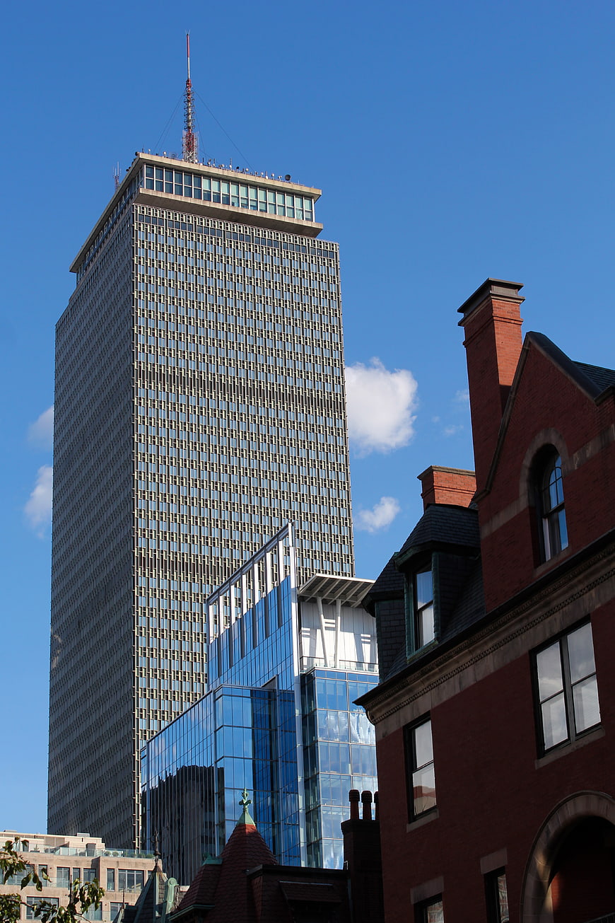 Modern Skyscraper and Historic Brick Building Cityscape