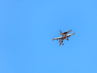 FA-18 Hornet Fighter Jet Landing Against Blue Sky