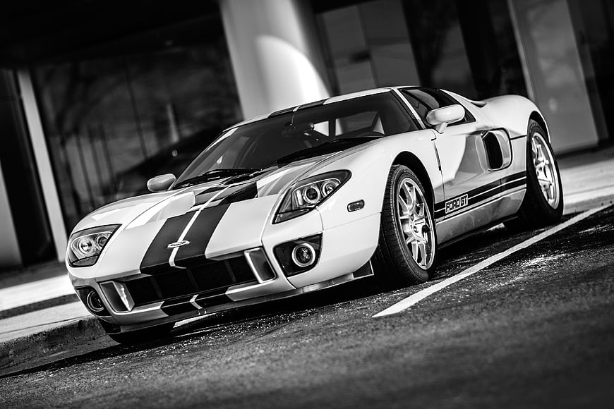 Black and white Ford GT sports car parked on street
