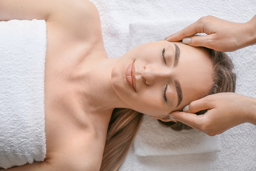 Relaxing Head Massage on Woman in Spa