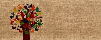 Multicultural handprint tree on burlap background