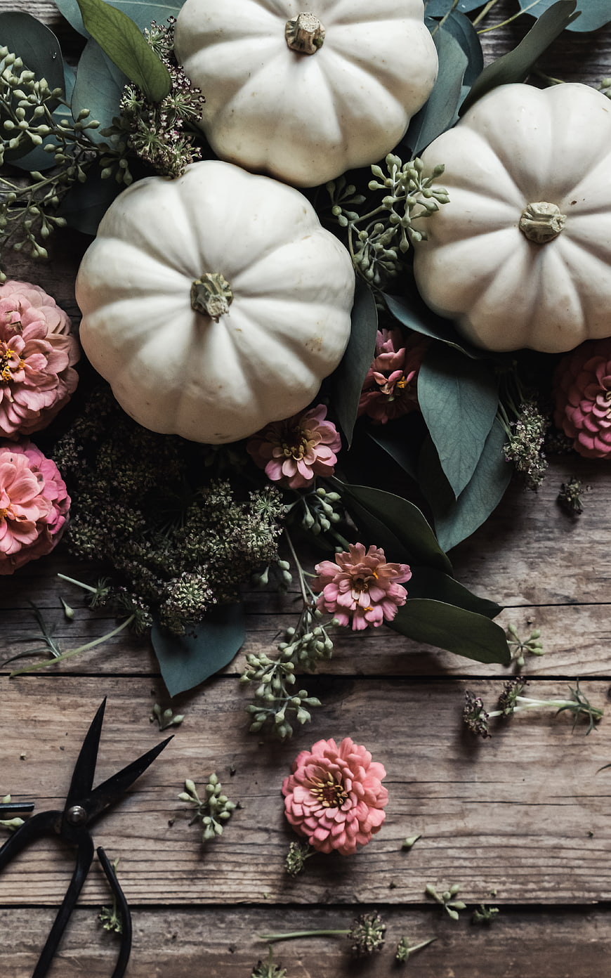 Rustic White Pumpkins and Pink Flowers Flat Lay