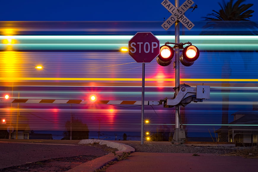 Long Exposure Train Crossing with Light Trails at Night
