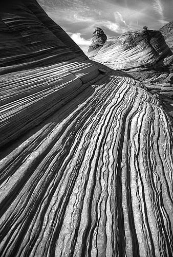 Black and White Photo of Layered Sandstone Rock Formations