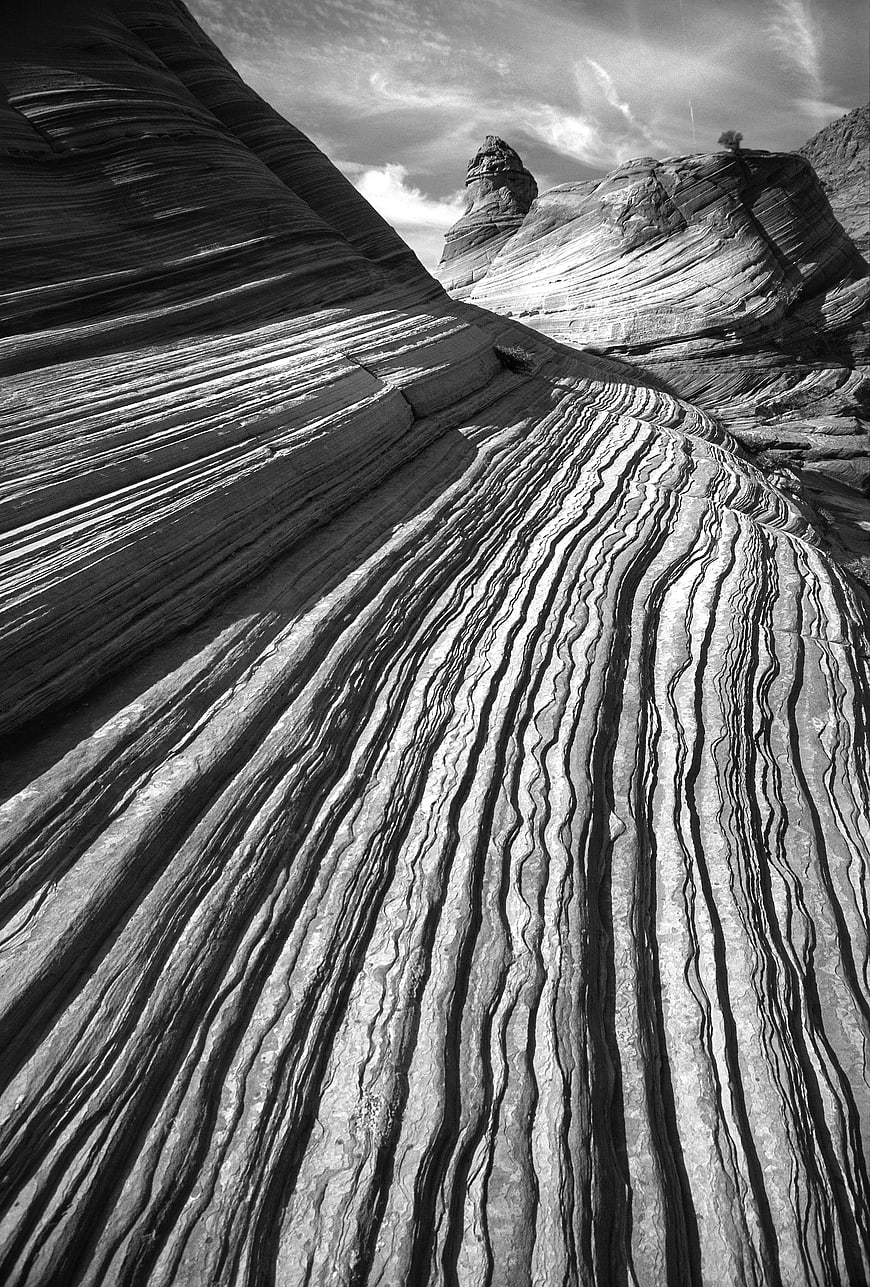 Black and White Photo of Layered Sandstone Rock Formations