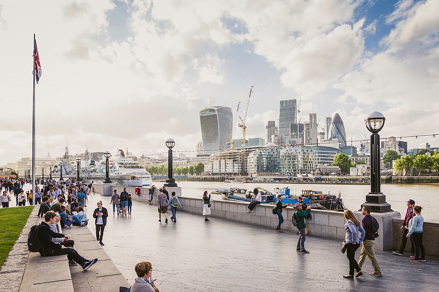London Southbank skyline with tourists and River Thames