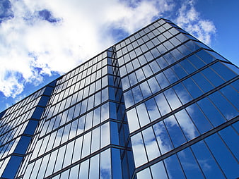 Modern Glass Skyscraper Reflections Blue Sky