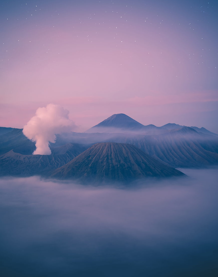 Pixel Art Mountain Landscape With Pink Sky And Clouds
