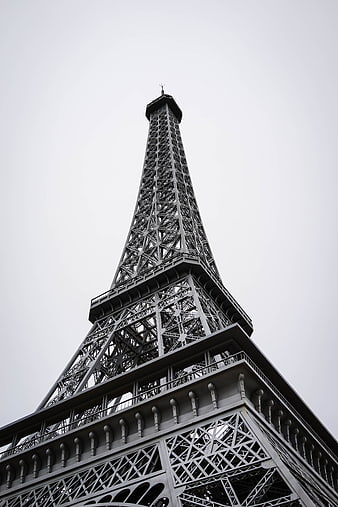 Low Angle View of Eiffel Tower Against Overcast Sky